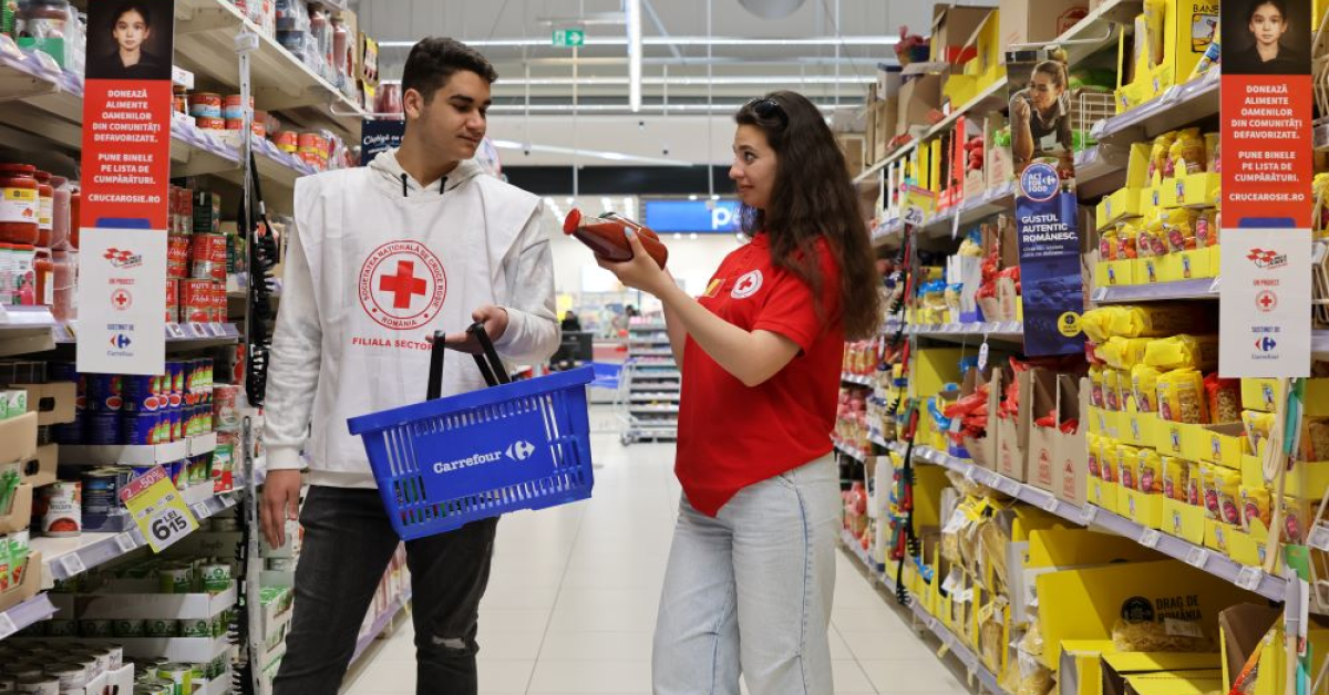 Carrefour și Crucea Roșie aduc masa de Crăciun pentru familiile defavorizate. Unde pot dona românii